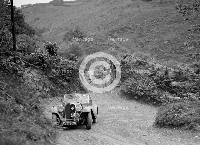 1935 Triumph Gloria Southern Cross taking part in a motoring trial in Devon, late 1930s. Artist: Bill Brunell.