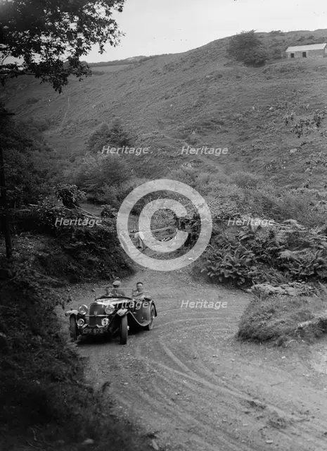 1935 AC tourer taking part in a motoring trial, late 1930s. Artist: Bill Brunell.