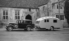 1935 Austin Light 13.9 Ascot saloon with Winchestr Royal caravan. Creator: Unknown