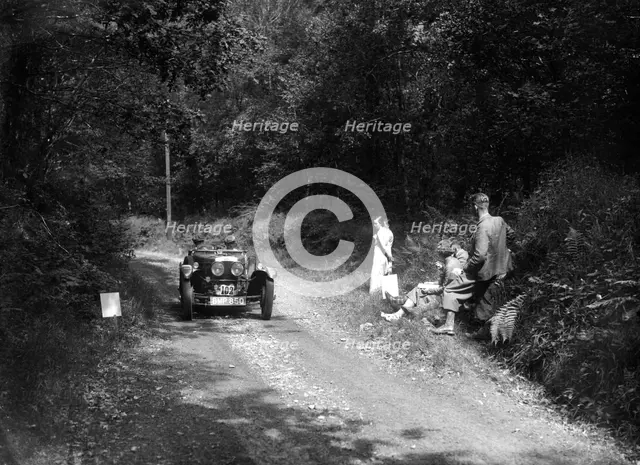 1935 Frazer-Nash TT replica taking part in a motoring trial, late 1930s. Artist: Bill Brunell.