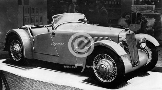 1935 Georges Irat at a motorshow. Creator: Unknown.