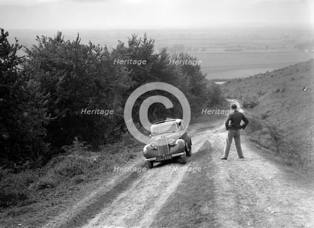 1935 Hillman Minx 1185 cc competing in a Talbot CC trial. Artist: Bill Brunell.