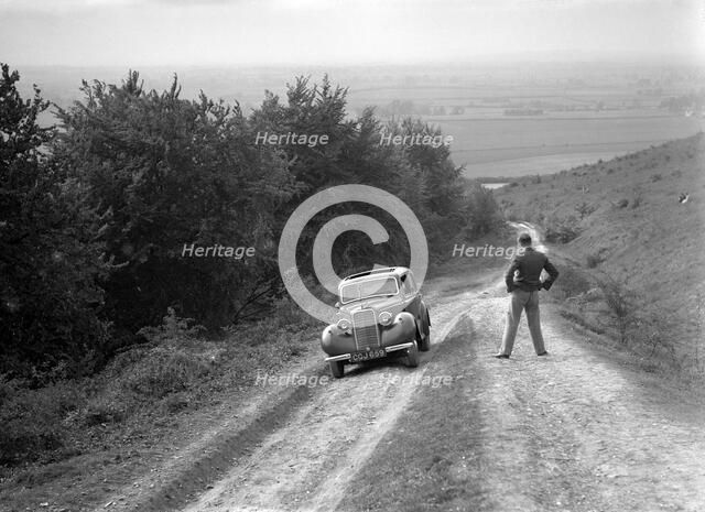 1935 Hillman Minx 1185 cc competing in a Talbot CC trial. Artist: Bill Brunell.