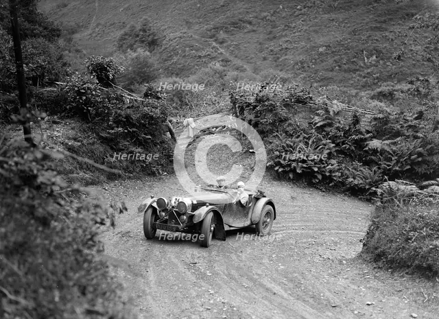 1935 Jaguar SS 90 2-seater taking part in a motoring trial, late 1930s. Artist: Bill Brunell.