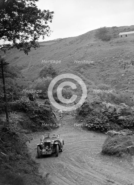 1935 MG PA taking part in a motoring trial in Devon, late 1930s. Artist: Bill Brunell.