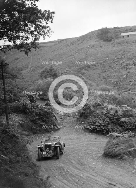 1935 MG PA taking part in a motoring trial in Devon, late 1930s. Artist: Bill Brunell.