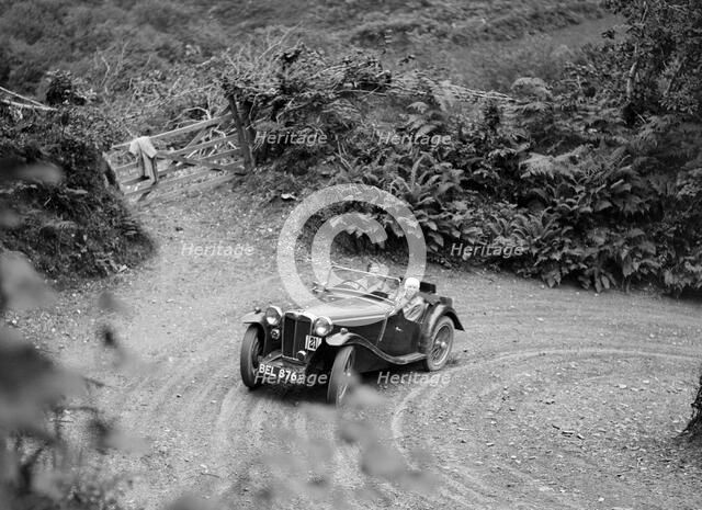 1935 MG PB taking part in a motoring trial in Devon, late 1930s. Artist: Bill Brunell.