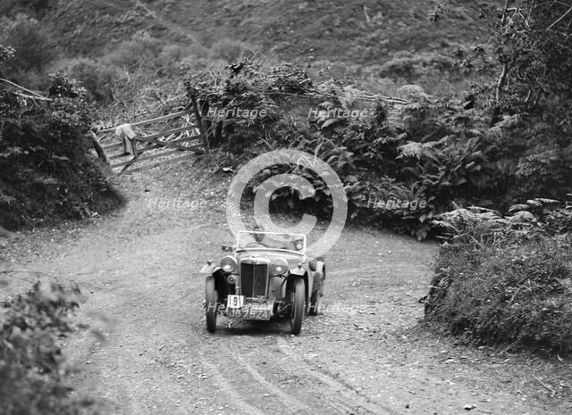 1935 MG PB of the Cream Cracker Team taking part in a motoring trial in Devon, late 1930s. Artist: Bill Brunell.