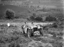 1935 MG PB of the Cream Cracker team taking part in the NWLMC Lawrence Cup Trial, 1937. Artist: Bill Brunell