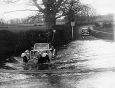 1935 Singer 1.5 Litre Le Mans taking part in a water splash trial, (1935?)