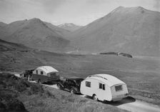 1936 Austin Twenty with caravan and 1936 Oldsmobile Eight with caravan. Creator: Unknown
