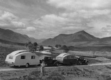 1936 Austin Twenty with caravan and 1936 Oldsmobile Eight with caravan. Creator: Unknown