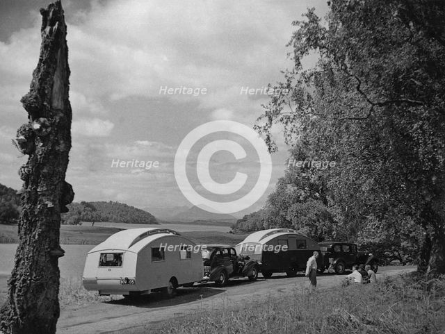 1936 Austin Twenty with caravan and 1936 Oldsmobile Eight with caravan. Creator: Unknown.