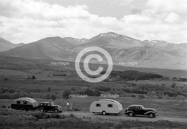 1936 Austin Twenty with caravan and 1936 Oldsmobile Eight with caravan. Creator: Unknown.