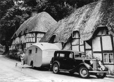 1936 Austin Twenty with caravan. Creator: Unknown