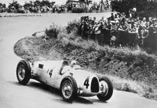 1936 Auto Union C type, Rosemeyer at German Grand Prix. Creator: Unknown