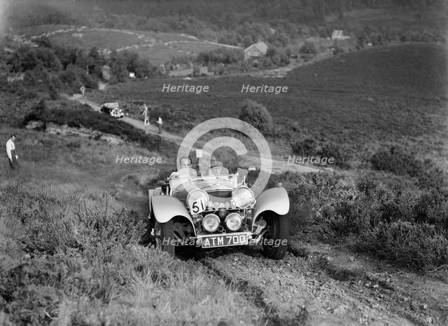 1936 Jaguar SS100 taking part in the NWLMC Lawrence Cup Trial, 1937. Artist: Bill Brunell.