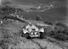 1936 Jaguar SS100 taking part in the NWLMC Lawrence Cup Trial, 1937. Artist: Bill Brunell
