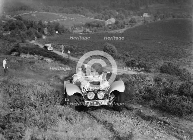 1936 Jaguar SS100 taking part in the NWLMC Lawrence Cup Trial, 1937. Artist: Bill Brunell.