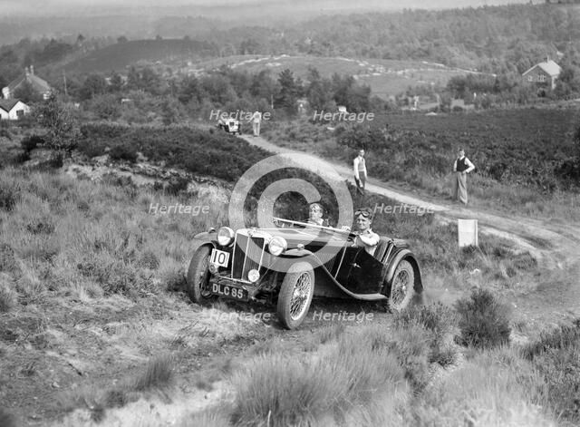 1936 MG TA taking part in the NWLMC Lawrence Cup Trial, 1937. Artist: Bill Brunell.