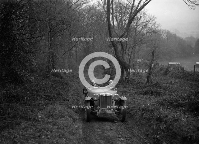 1936 MG TA taking part in a motoring trial, late 1930s. Artist: Bill Brunell.