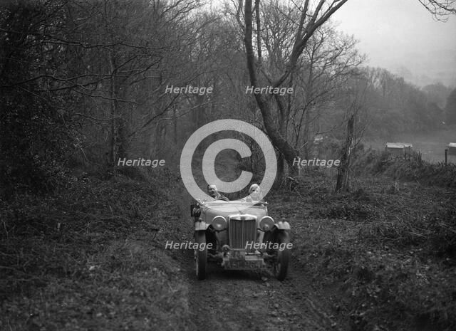 1936 MG TA taking part in a motoring trial, late 1930s. Artist: Bill Brunell.