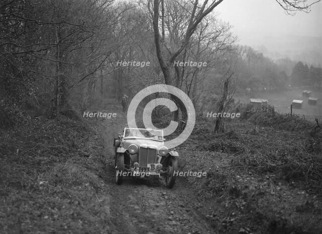 1936 MG TA taking part in a motoring trial, late 1930s. Artist: Bill Brunell.