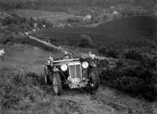 1936 MG TA of the Three Musketeers team taking part in the NWLMC Lawrence Cup Trial, 1937. Artist: Bill Brunell