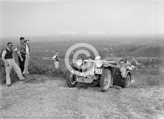 1936 MG TA of the Three Musketeers team taking part in the NWLMC Lawrence Cup Trial, 1937. Artist: Bill Brunell.