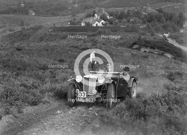 1936 MG TA of the Three Musketeers team taking part in the NWLMC Lawrence Cup Trial, 1937. Artist: Bill Brunell.