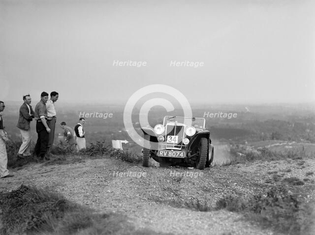 1936 MG PB 2-seater sports taking part in the NWLMC Lawrence Cup Trial, 1937. Artist: Bill Brunell.