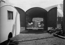 1937 Hillman 14 in rail transportation carriage van. Creator: Unknown