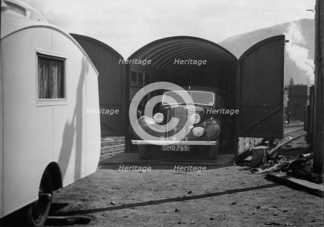 1937 Hillman 14 in rail transportation carriage van. Creator: Unknown.
