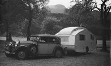 1937 Mercedes Benz 260D Cabriolet towing caravan. Creator: Unknown