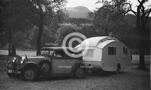 1937 Mercedes Benz 260D Cabriolet towing caravan. Creator: Unknown.