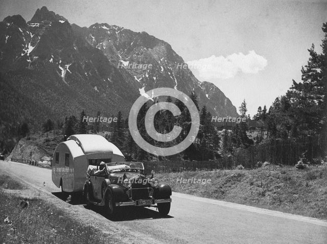 1937 Mercedes Benz 260D Cabriolet towing caravan. Creator: Unknown.