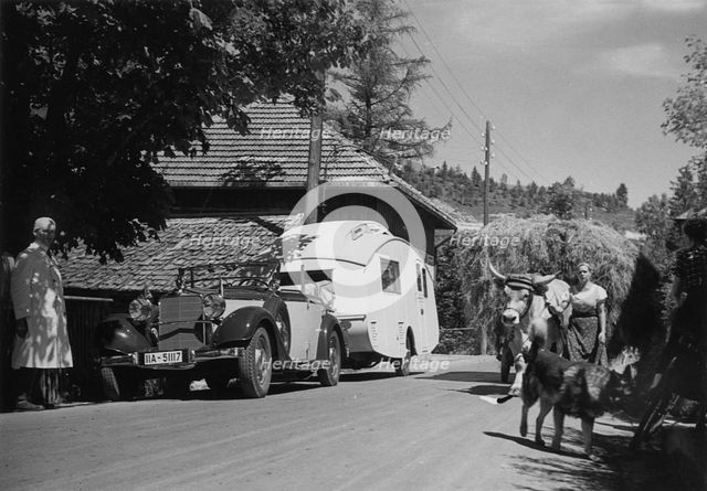 1937 Mercedes Benz 260D Cabriolet towing caravan. Creator: Unknown.