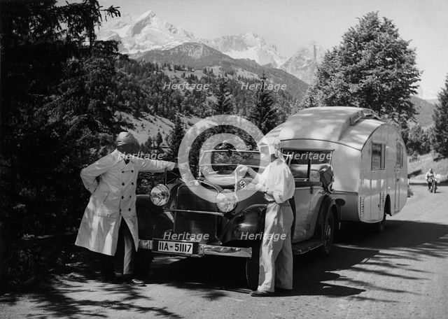 1937 Mercedes Benz 260D Cabriolet towing caravan. Creator: Unknown.