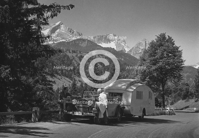 1937 Mercedes Benz 260D Cabriolet towing caravan. Creator: Unknown.