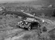 1937 Standard Twelve open 4-seater taking part in the NWLMC Lawrence Cup Trial, 1937. Artist: Bill Brunell