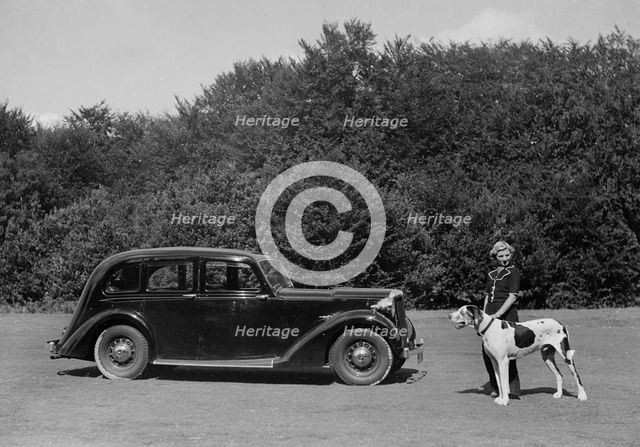 1938 Daimler DB18 with lady and her pet dog. Creator: Unknown.