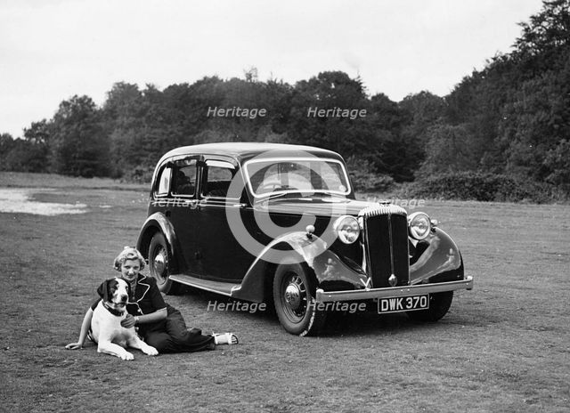 1938 Daimler DB18 with lady and her pet dog. Creator: Unknown.