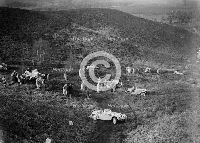 1938 Frazer-Nash BMW 328 taking part in a motoring trial, late 1930s. Artist: Bill Brunell.