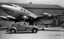 1938 Lagonda V12 4.5 litre drophead coupe with D.H. Albatross aeroplane