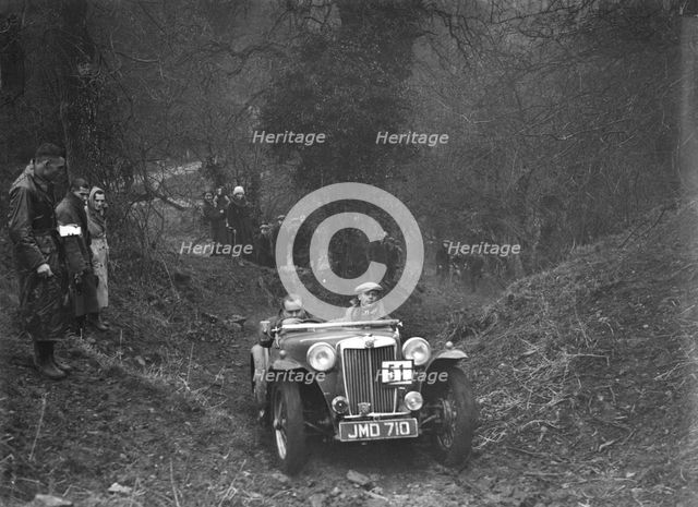 1938 MG TA taking part in the Petersfield Trial, 1938. Artist: Bill Brunell.