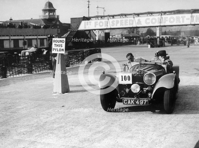 1938 S.S. 100 at Brooklands suring Junior Car Club event 25th March 1939 Artist: Unknown.