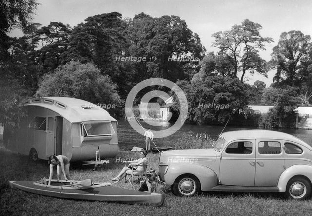 1939 Ford V8-91 with caravan. Creator: Unknown.