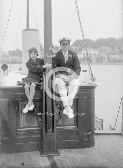 1st Earl of Birkenhead with his daughter on board their yacht, (Isle of Wight?), c1925. Creator: Kirk & Sons of Cowes.