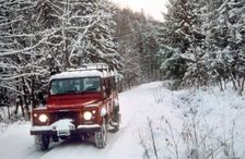 2001 Land Rover Defender driving in snowy conditions. Creator: Unknown