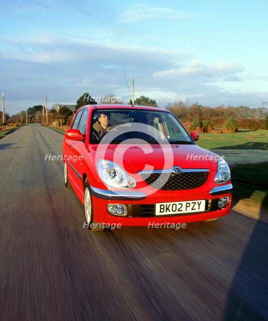 2002 Daihatsu Sirion 1.3 SL. Artist: Unknown.